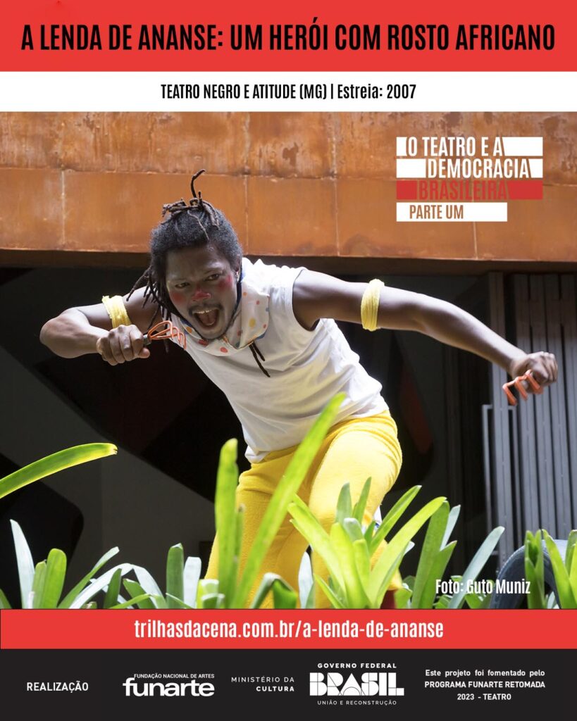 Arte de divulgação. Uma pessoa vestindo camisa branca e calça amarela agacha-se energicamente entre plantas verdes, com um rosto expressivo e punhos erguidos, em frente a uma parede cor de ferrugem. Foto: Guto Muniz